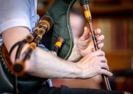 Person playing bagpipes