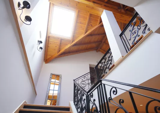 Staircase with a skylight above