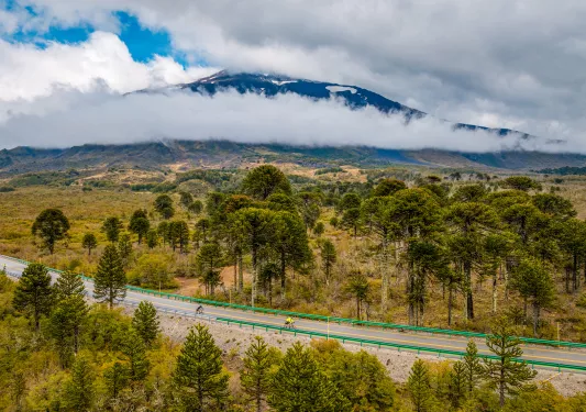 Large, open valley with an empty road in the center