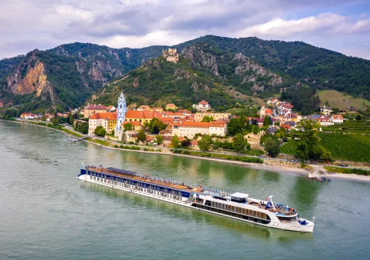 Large boat floating on a long river