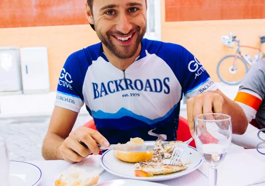 Man eating a plate full of food
