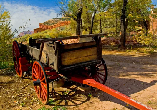 Rustic black and red wagon with a trailer hitch