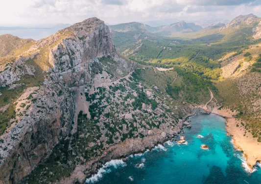 Large mountains and cliffs with a lake on the ground floor