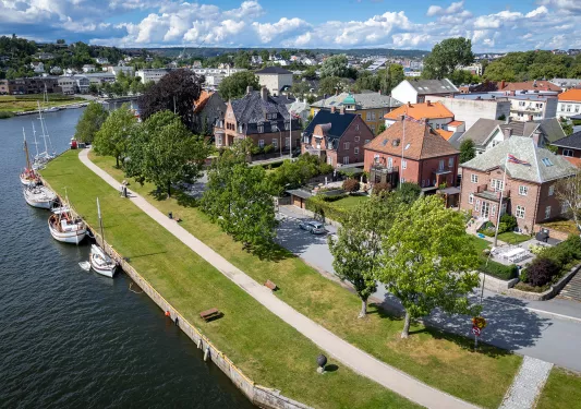 Brick houses along the water shore
