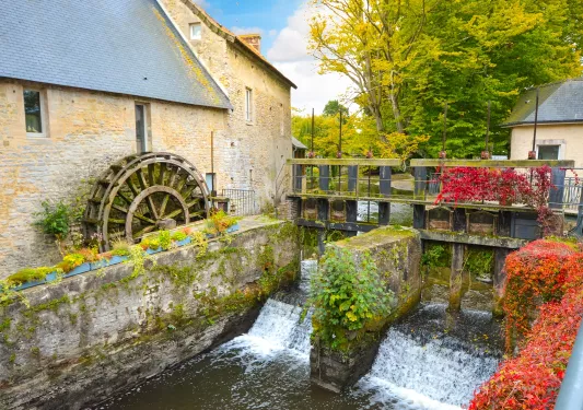 Stone building with a small water dam underneath
