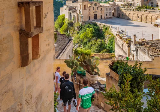 Backroads guests walking through an old Italian town