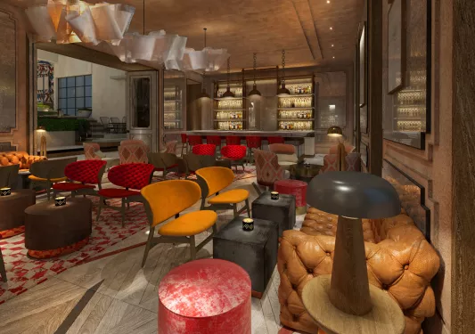 Bar and lounge with cushioned red and orange chairs, and alcohol on shelves in the back