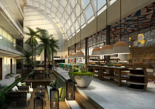 Modern hotel lobby with large windows and long dining tables