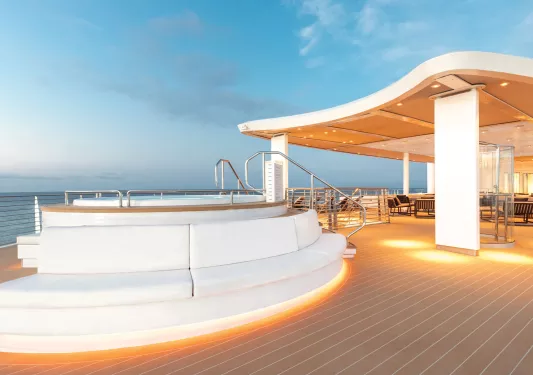 Boat dock with a hot tub on top