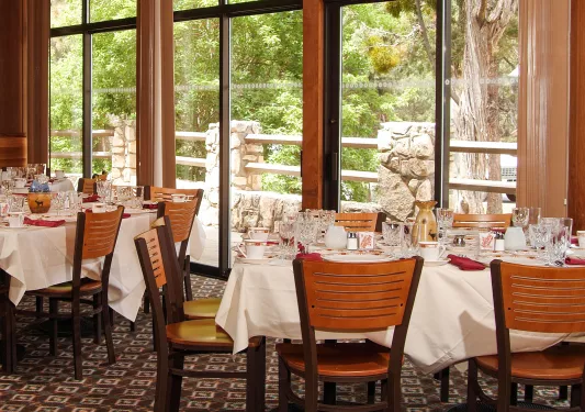 Dining area with large windows and tables