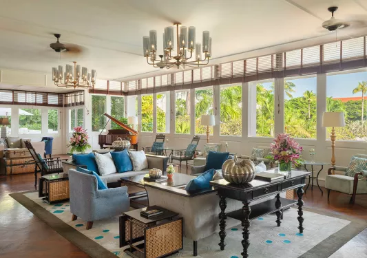 Hotel lobby and waiting room with cushioned sofas and large windows