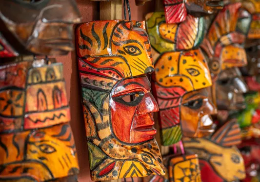 Carved, wooden sculptures of traditional masks