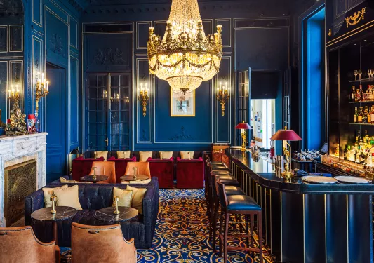Blue room with a bar and lounge