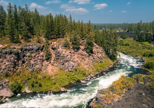 Active river in between two large mountains