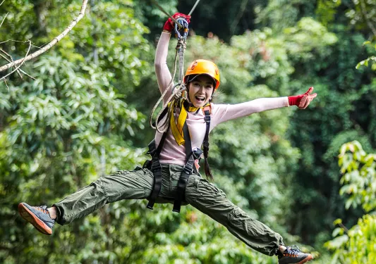 Backroads guest on a zipline