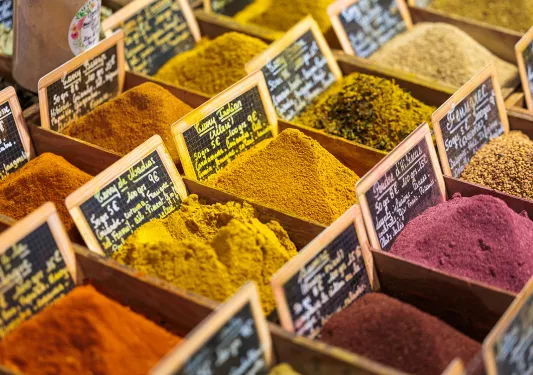 Small mounds of spices at a vendor stall