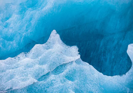 Ice cap on top of a mountain of snow