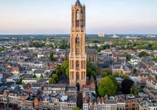 Large church bell tower in the center of a town