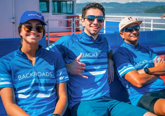 Backroads guests in cycling jerseys on a ferry