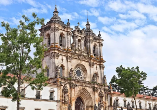 View of a rustic, castle-like church building