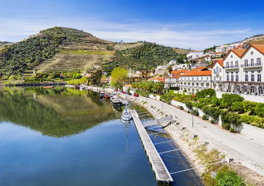 Boat dock next to a row of buildings