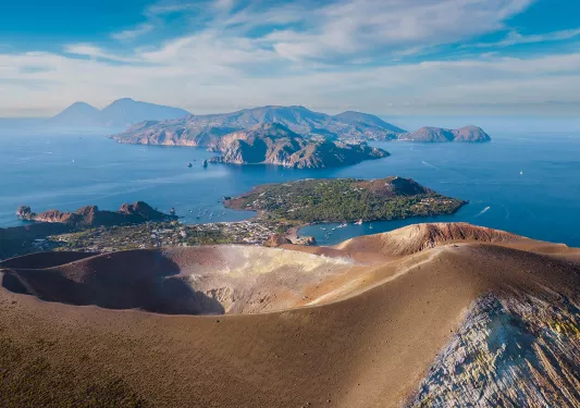 Rolling hills through the clouds
