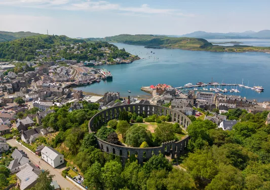 Bundle of houses and building with a lake to the right