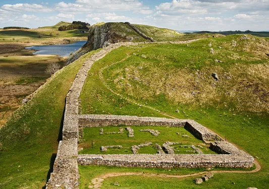 Stone ruins in a grassy hill
