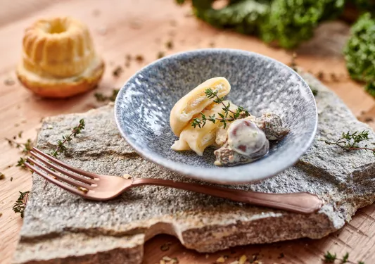Plate of dessert on top of a stone