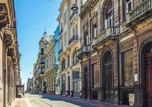 Road with large, European-style apartment buildings on either side