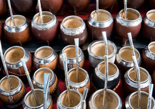 Cluster of mate cups with metal straws