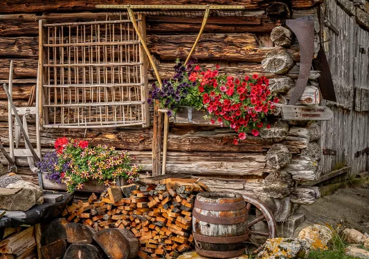 Wooden cabin with flower pots hanging outside