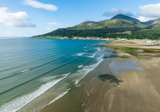 Beach with blue water and small waves