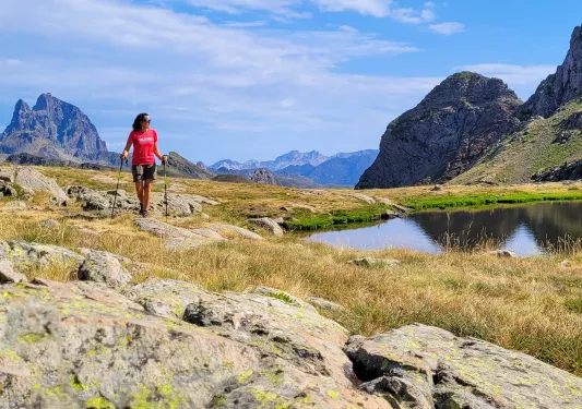 Backroads guest hiking by a lake