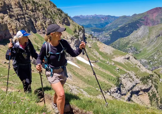 Backroads guests hiking with hiking poles
