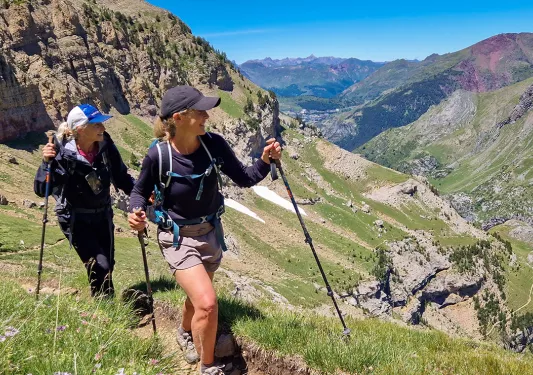 Two backroads guests hike through the mountains