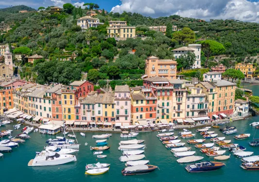 Exterior view of a row of houses along a boat dock