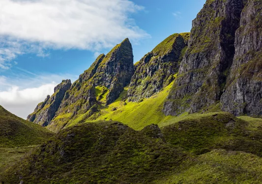Large grassy canyons in the middle of a valley