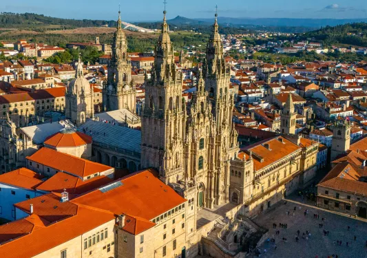 Exterior view of castle-like building in the middle of a town square