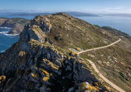 Top view of a slanted mountain with a long trail