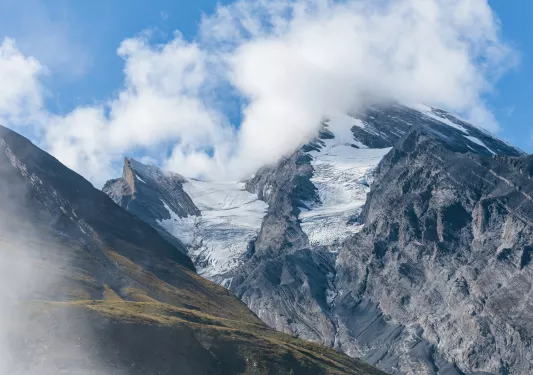 Mountains with clouds over them