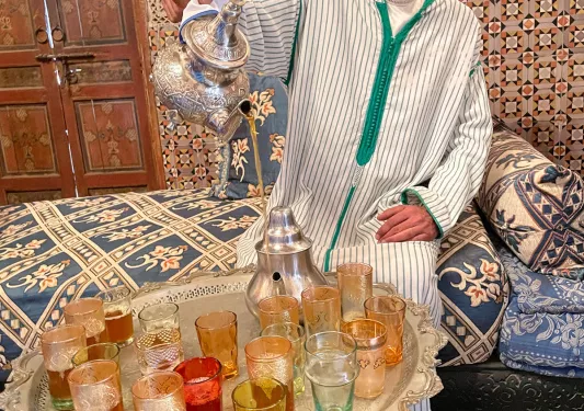 Man with a large tray full of drink