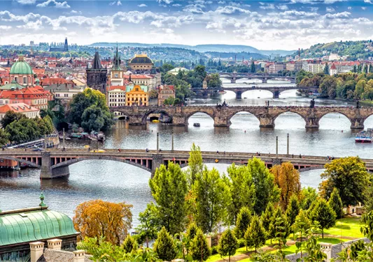 Scenic view of bridges on the Vltava river and of the historical center of Prague