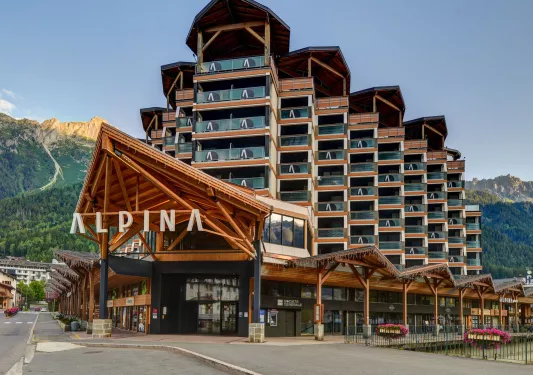Exterior view of hotel building with rooms with large balconies