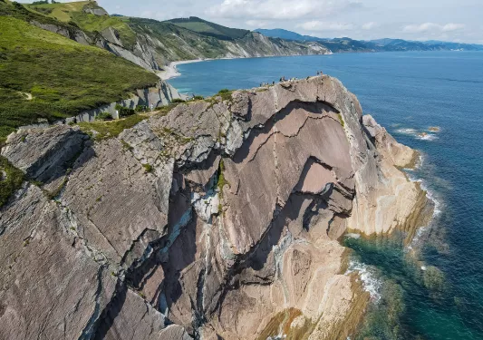 Large cliffs by the shore of an ocean
