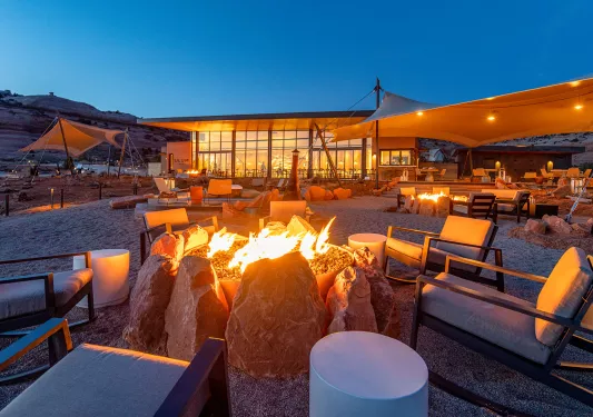 Outdoor patio next to a building in the middle of the desert