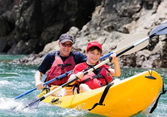 A father and son Kayaking in Costa Rica on a Backroads multisport trip