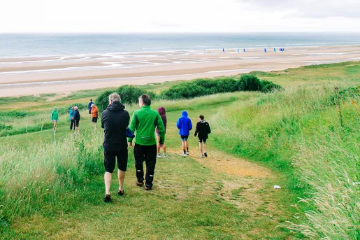 Backroads Guests Walking to the Beach in Brittany/Normandy