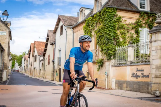 Backroads Guest Biking Through Town