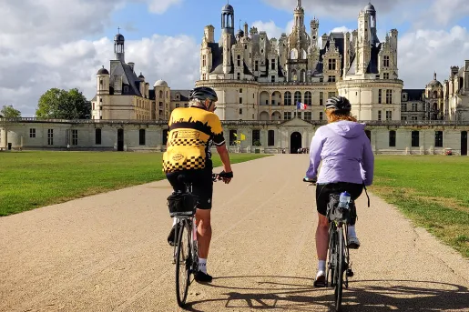 Two Backroads Guests Biking to Castle